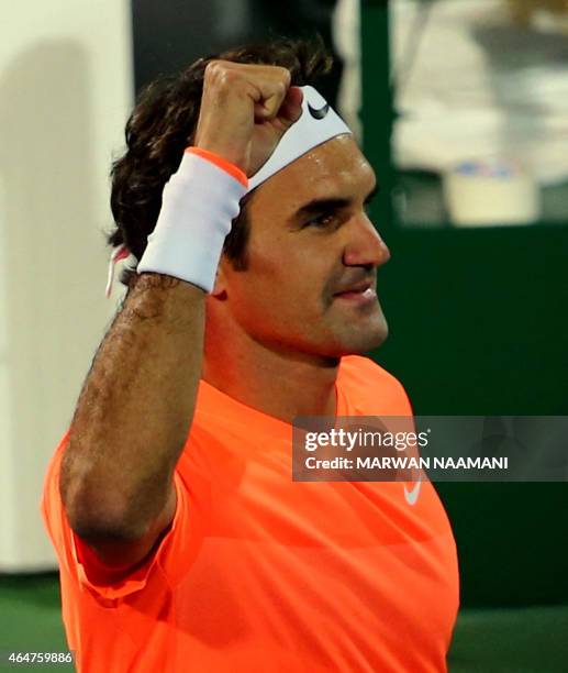 Roger Federer of Switzerland gestures after defeating World number one Novak Djokovic of Serbia during their final match on the fifth day of the ATP...