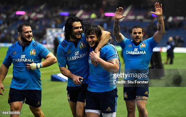 Italy players Luke McLean and winger Michele Visentin celebrate after the RBS Six Nations match between Scotland and Italy at Murrayfield Stadium on...