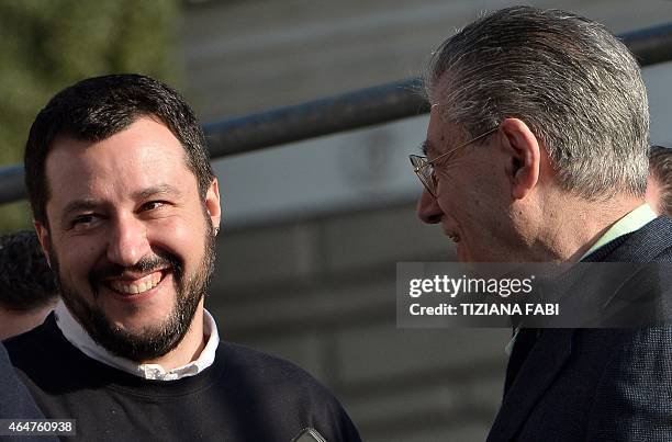 Italian Northern League founder Umberto Bossi lspeaks with the leader of the party, Matteo Salvini during a rally against Italian government in Rome...