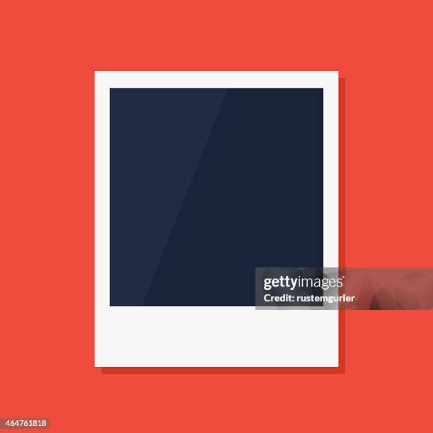 empty polaroid photo frame in red background - single object photos stock illustrations
