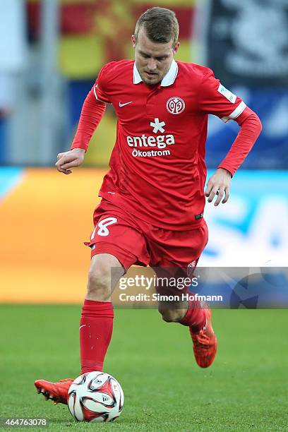 Daniel Brosinski of Mainz runs with the ball during the Bundesliga match between 1899 Hoffenheim and 1. FSV Mainz 05 at Wirsol Rhein-Neckar-Arena on...