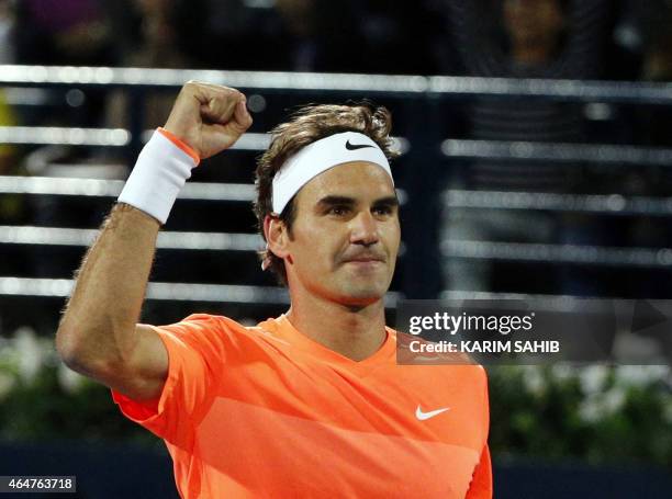 Roger Federer of Switzerland gestures to the crowd after defeating World number one Novak Djokovic of Serbia during their final match on the fifth...