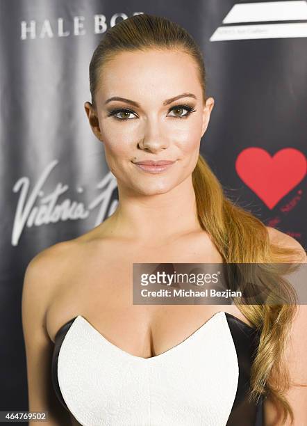 Actress Caitlin O'Connor attends Caroline Burt DJs At Victoria Fuller's "The Beauty Code: Art Show" at The Redbury Hotel on February 25, 2015 in...