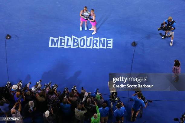 Sara Errani of Italy and Roberta Vinci of Italy pose with the winners trophy after winning their doubles final match against Elena Vesnina of Russia...