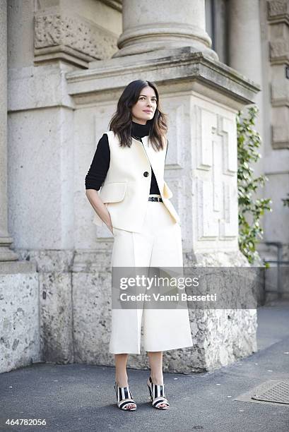 Guest poses wearing Celine before Jil Sander show on February 28, 2015 in Milan, Italy.