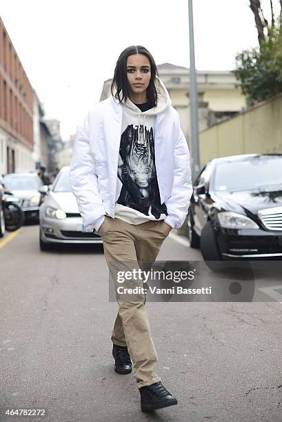 Model Binx Walton poses wearing an Hyein Seo jacket on February 28, 2015 in Milan, Italy.