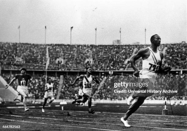 Jesse Owens running at 1936 Olympics in Berlin