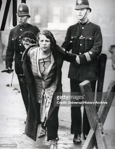 Suffragette arrested by police