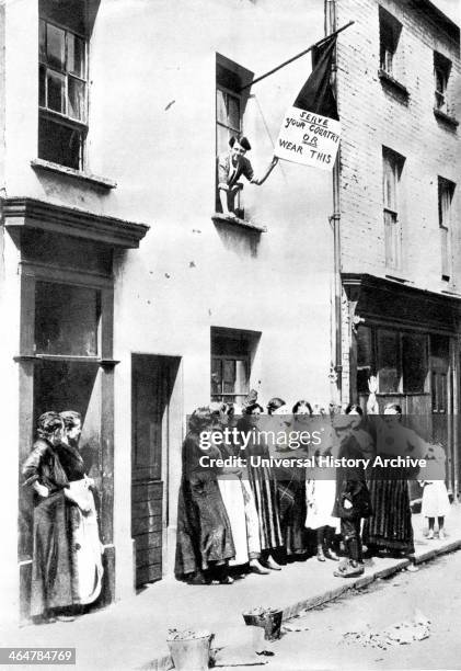 World War I - 1914 Working - class women trying to shame men into volunteering for the services by threatening to make them wear petticoats