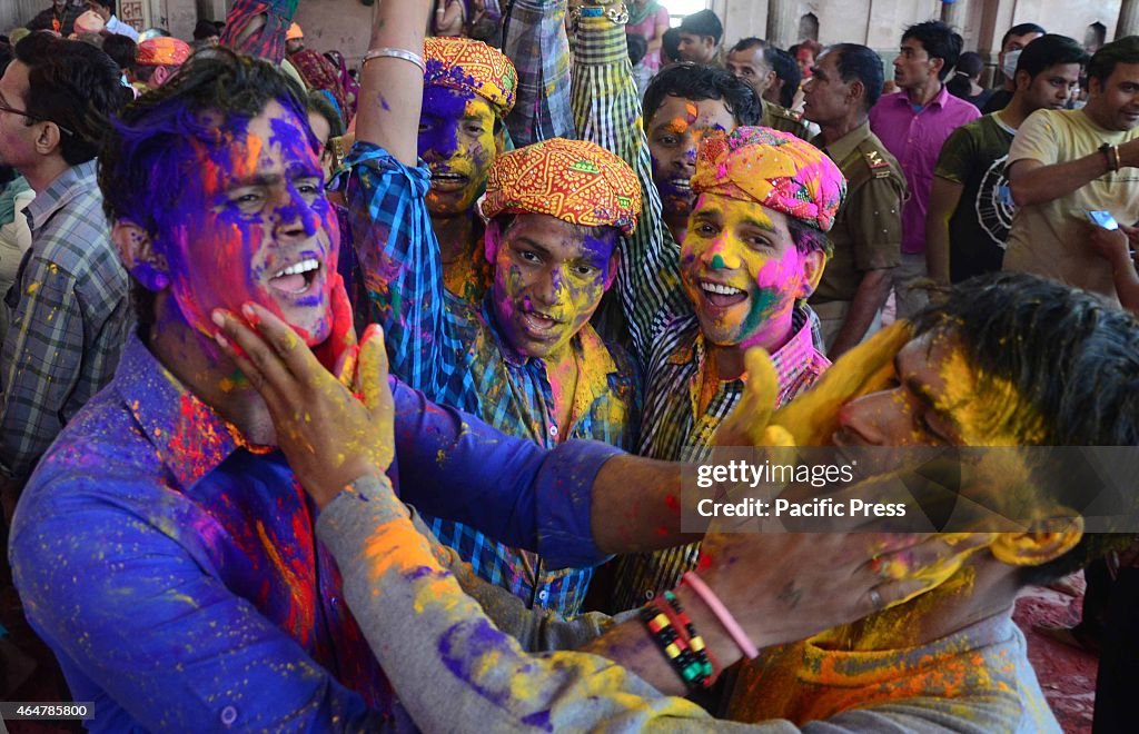 A devotee with a color on their face during hHoli Festival...