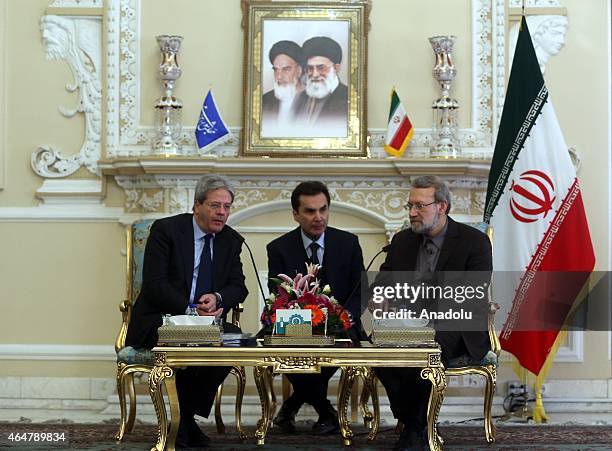 Iranian Parliamentary Speaker Ali Larijani and Italian Foreign Minister Paolo Gentiloni are seen during a meeting held at the Parliament in Tehran,...