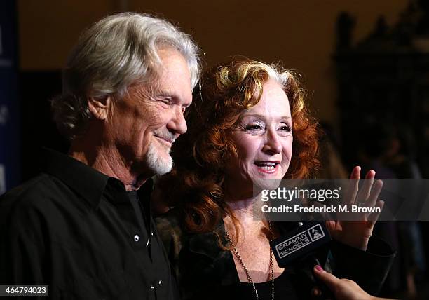 Actor/recording artist Kris Kristofferson and recording artist Bonnie Raitt attend the 56th GRAMMY Awards Foundation Legacy Concert at The Wilshire...