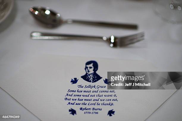 People enjoy a Burns supper in the red room at Burns Cottage Pavilion on January 23, 2014 in Alloway, Scotland. People around the world will mark the...