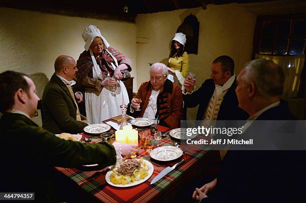 Group re-enact the first ever Burns Supper held in 1801 on the fifth anniversary of his death inside the cottage where he was born in 1759 on January...