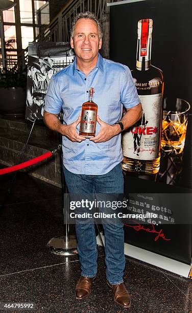 Actor Ethan Wayne, son of actor John Wayne, signs bottles of Duke Bourbon during 186th PHS Philadelphia Flower Show, "Celebrate the Movies", at...