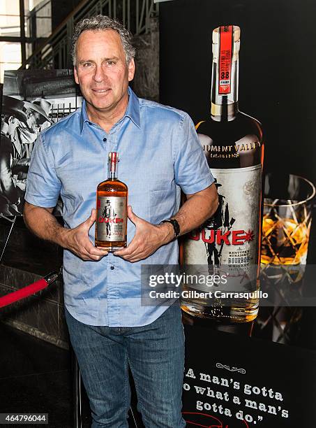 Actor Ethan Wayne, son of actor John Wayne, signs bottles of Duke Bourbon during 186th PHS Philadelphia Flower Show, "Celebrate the Movies", at...