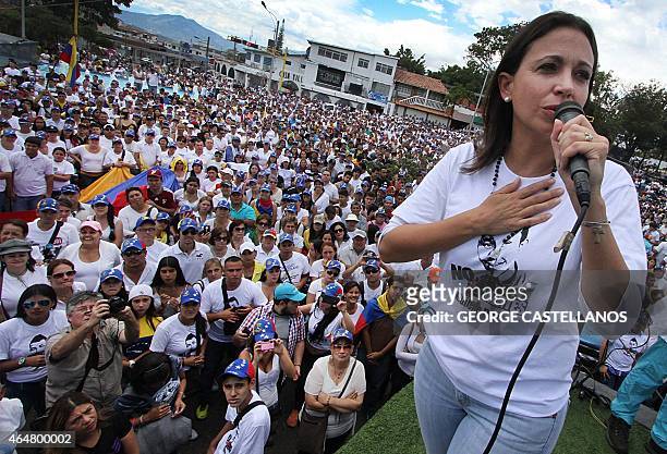 Venezuelan opposition leader Maria Corina Machado addresses supporters during a protest against Venezuelan President Nicolas Maduro's government in...