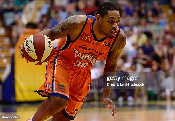 Demetri McCamey of the Taipans drives to the basket during the round 15 NBL match between the Townsville Crocodiles and the Cairns Taipans at...