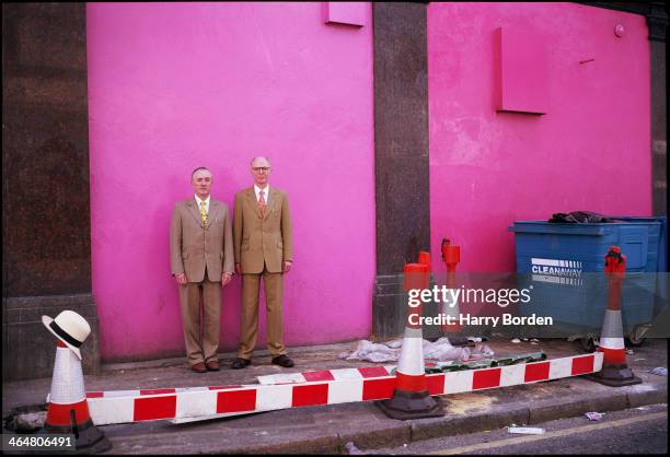 Artists Gilbert and George are photographed for the Herald Heral on May 29, 2001 in London, England.