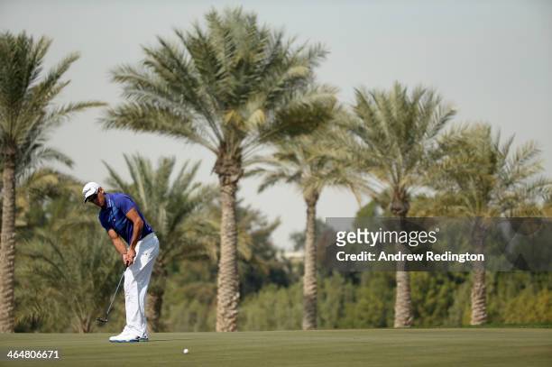 Rafa Cabrera-Bello of Spain putts for birdie on the second hole during the third round of the Commercial Bank Qatar Masters at Doha Golf Club on...