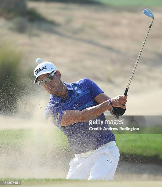 Rafa Cabrera-Bello of Spain plays a bunker shot on the sixth hole during the third round of the Commercial Bank Qatar Masters at Doha Golf Club on...