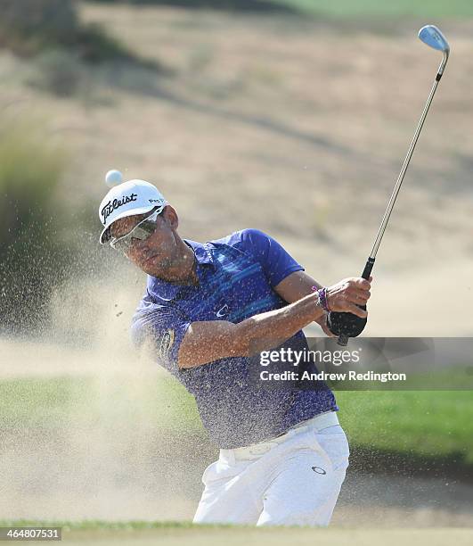 Rafa Cabrera-Bello of Spain plays a bunker shot on the sixth hole during the third round of the Commercial Bank Qatar Masters at Doha Golf Club on...