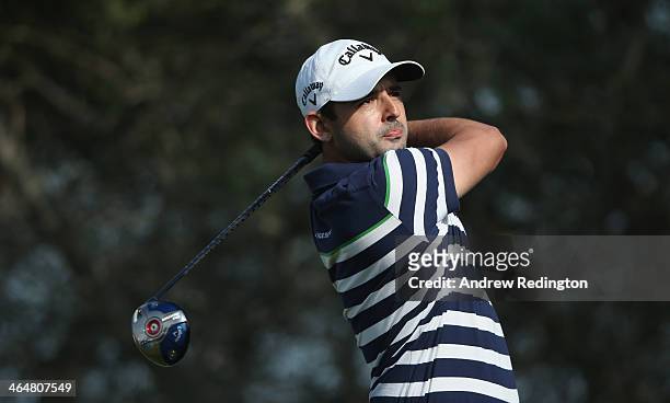 Fabrizio Zanotti of Paraguay hits his tee-shot on the 18th hole during the third round of the Commercial Bank Qatar Masters at Doha Golf Club on...