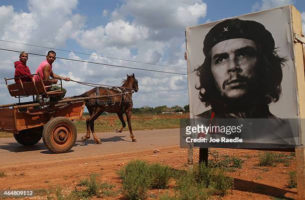 Poster of Revolutionary hero Che Guevara is seen next to the road a day after the second round of diplomatic talks between the United States and...