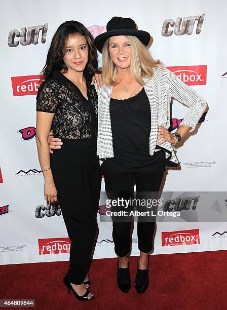 Actors Rosie Garcia and Kristine DeBell arrive for the Los Angeles Premiere of "Cut!" held at Arena Theater on February 13, 2015 in Hollywood,...