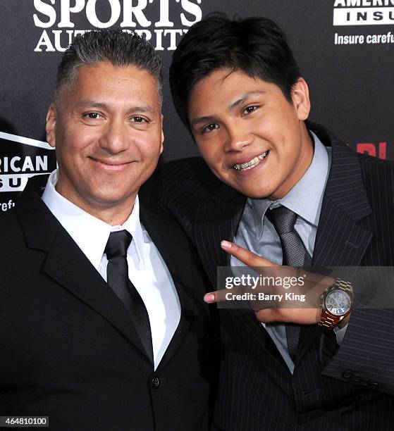 Runner Jose Cardenas and actor Johnny Ortiz arrive at the world premiere of 'McFarland, USA' at the El Capitan Theatre on February 9, 2015 in...