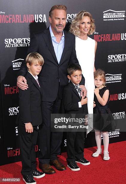 Cayden Wyatt Costner, actor Kevin Costner, Hayes Logan Costner,Christine Baumgartner and Grace Avery Costner arrive at the world premiere of...