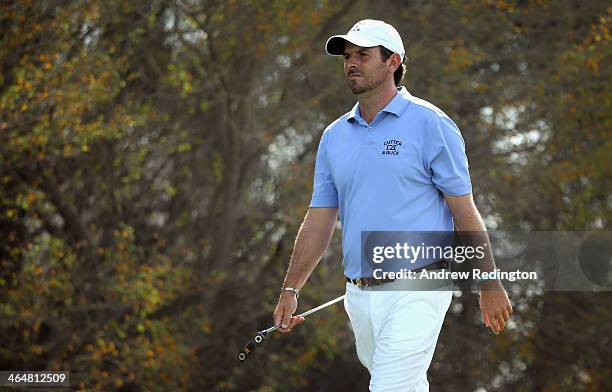 Thomas Aiken of South Africa in action during the third round of the Commercial Bank Qatar Masters at Doha Golf Club on January 24, 2014 in Doha,...