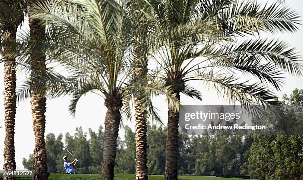 Thomas Aiken of South Africa in action during the third round of the Commercial Bank Qatar Masters at Doha Golf Club on January 24, 2014 in Doha,...