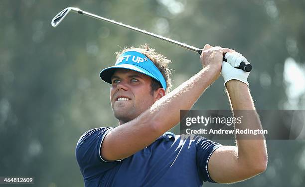 Johan Carlsson of Sweden in action during the third round of the Commercial Bank Qatar Masters at Doha Golf Club on January 24, 2014 in Doha, Qatar.