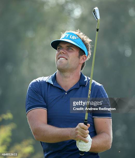 Johan Carlsson of Sweden in action during the third round of the Commercial Bank Qatar Masters at Doha Golf Club on January 24, 2014 in Doha, Qatar.