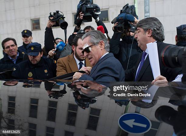 Ex-Bankia president Miguel Blesa gets into a waiting car after giving evidence at a Madrid courthouse relating to the collapse of the Spanish bank...