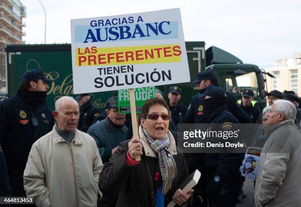 Bankia preferential shareholders protest outside a Madrid court where ex-Bankia president Miguel Blesa was giving evidence relating to the collapse...