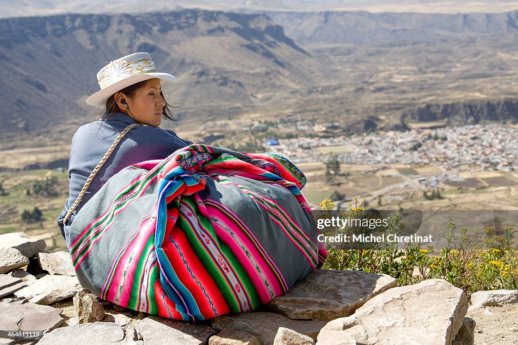 Peru : Young Woman with Hat and traditional manta
