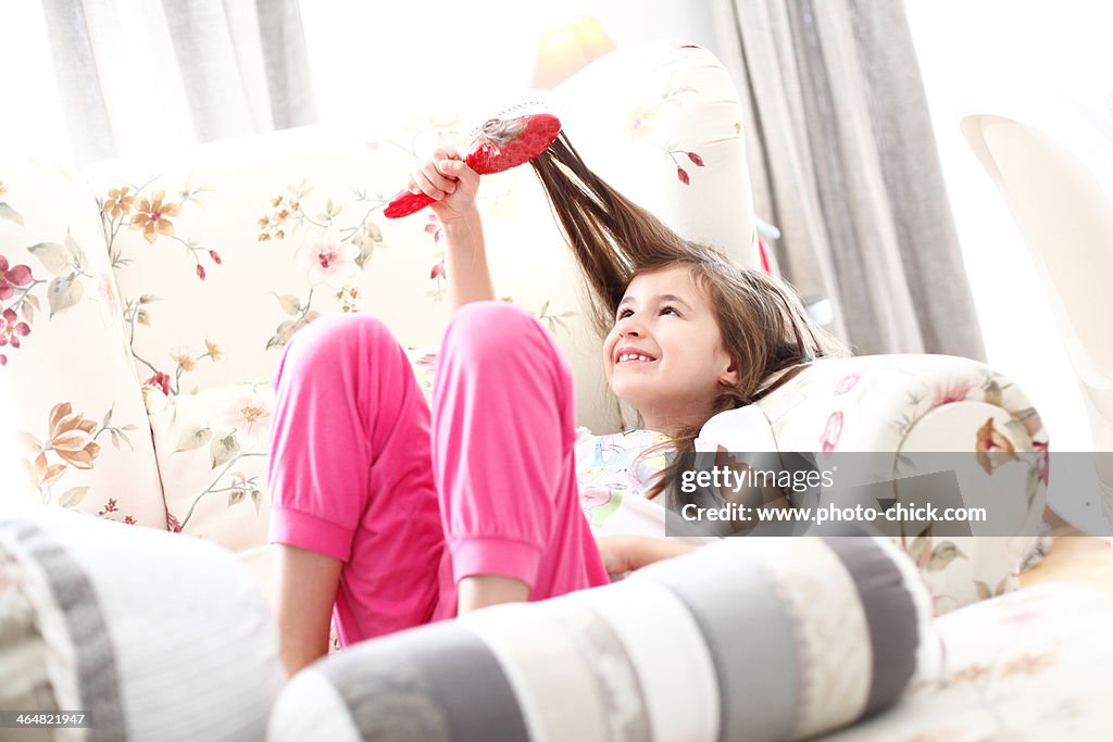 A girl brushing her hair