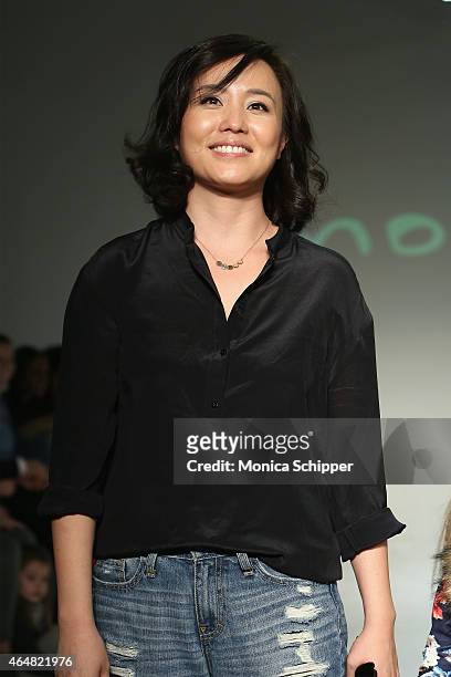 Designer HJ Chung walks the runway at the Imoga show during petitePARADE / Kids Fashion Week at Bathhouse Studios on February 28, 2015 in New York...