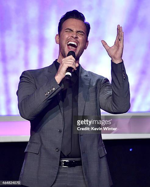 Actor Cheyenne Jackson sings onstage during the Family Equality Council's 2015 Los Angeles Awards dinner at The Beverly Hilton Hotel on February 28,...