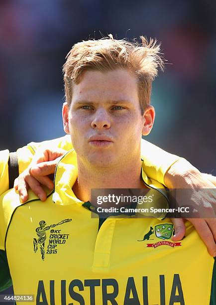 Steve Smith of Australia sings the Australian national anthem during the 2015 ICC Cricket World Cup match between Australia and New Zealand at Eden...