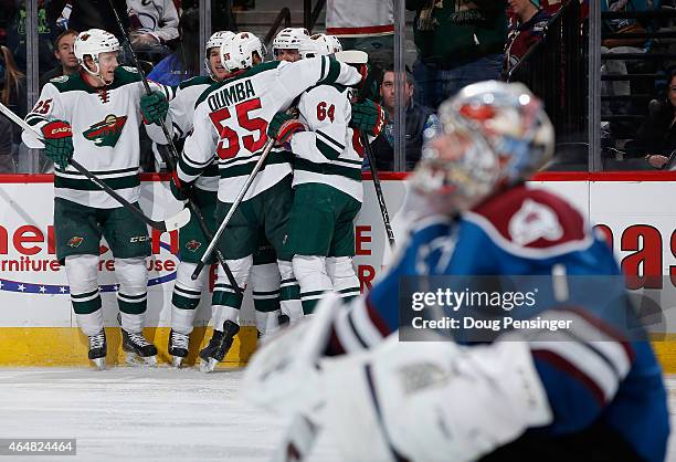 The Minnesota Wild celebrates a goal by Jason Pominville of the Minnesota Wild against goalie Semyon Varlamov of the Colorado Avalanche to take a 3-1...