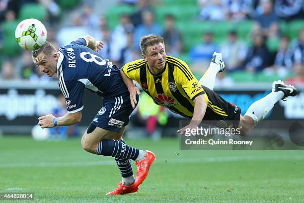 Besart Berisha of the Victory and Benjamin Sigmund of the Phoenix contest to head the ball during the round 19 A-League match between the Melbourne...