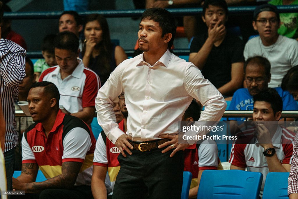 Team Kia coach Manny Pacquiao looks on while his team is...