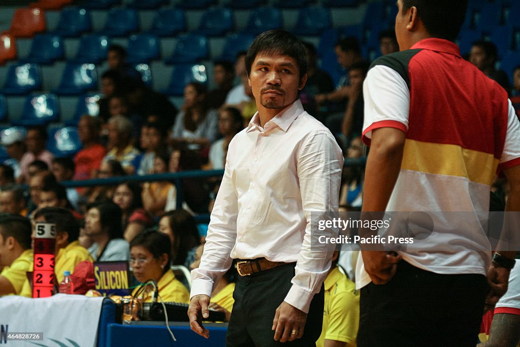 Team Kia coach Manny Pacquiao looks on his assistant coach...