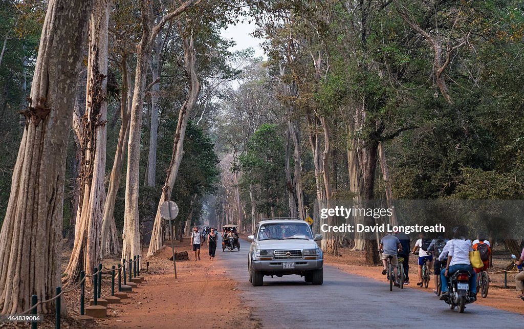 Tourist pass through the south gate of Bayon temple at the...