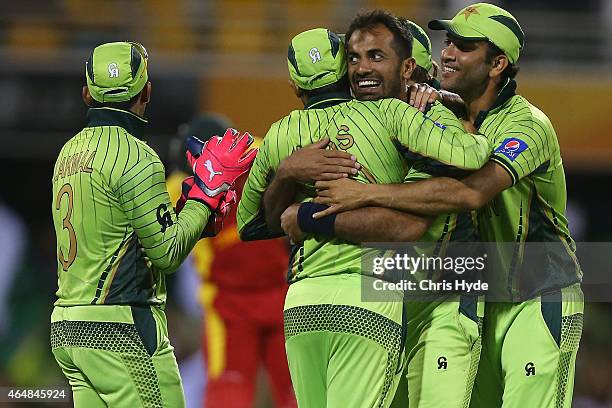 Wahab Riaz of Pakistan celebrates after taking the wicket of Craig Ervine of Zimbabwe during the 2015 ICC Cricket World Cup match between Pakistan...