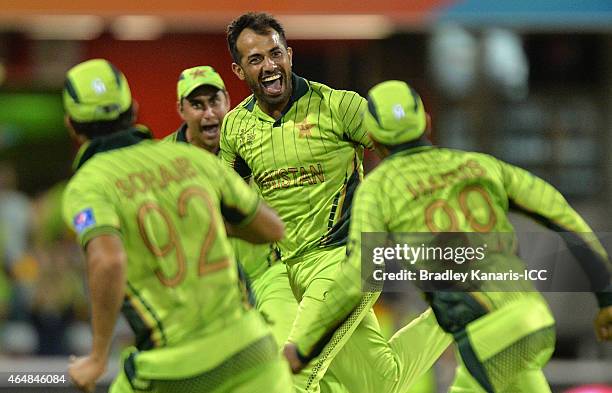 Wahab Riaz of Pakistan celebrates with team mates after taking the wicket of Tewanda Mupariwa of Zimbabwe during the 2015 ICC Cricket World Cup match...