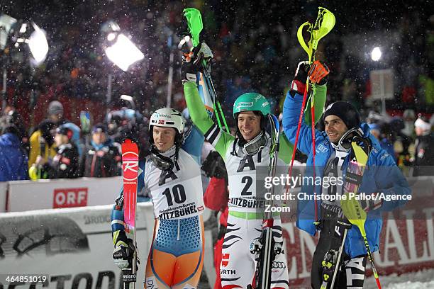 Felix Neureuther of Germany takes 1st place, Henrik Kristoffersen of Norway takes 2nd place, Patrick Thaler of Italy takes 3rd place during the Audi...